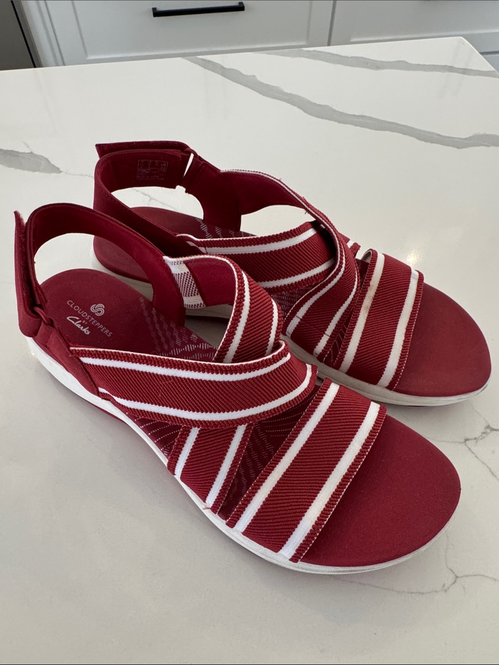 Clarks Cloudsteppers Mira Lily sport sandals.
Red and White. Size 12